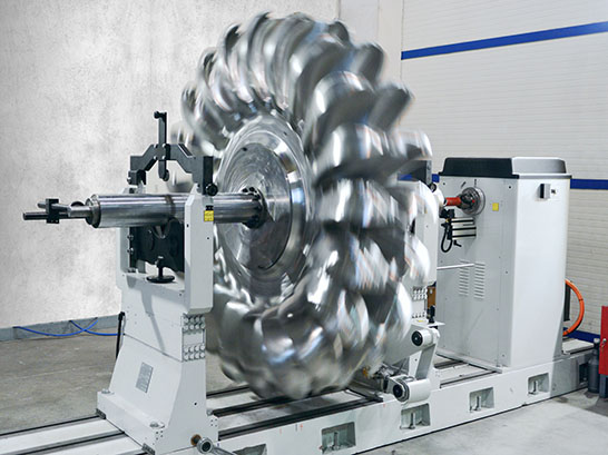 a balancing machine spinning and balancing part of a machine to fix it, done by flecor